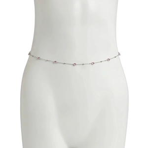 Close-up of slender silver waist chain with pink crystals and metallic beads