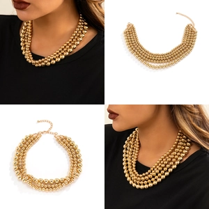 Layered gold beaded necklace for women in punk style with adjustable extender chain
