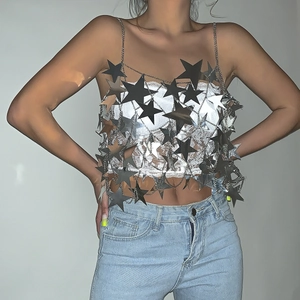 Detail of silver star sequin fringe body chain with metallic chain link craftsmanship