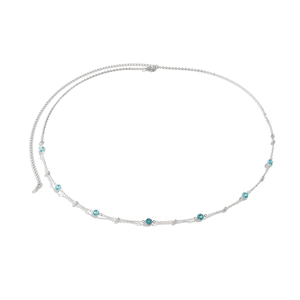 Detailed view of silver waist chain with blue crystal beads on a clean white background