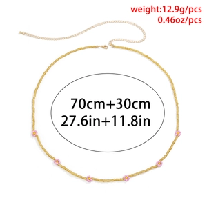 Colorful handmade seed bead daisy body chain with pink flowers and gold beads 70cm long