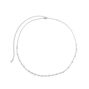Detail of silver body chain with geometric metal accents and lobster clasp on white background
