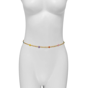 Detail of colorful daisy beads and gold seed beads on a bohemian style waist chain