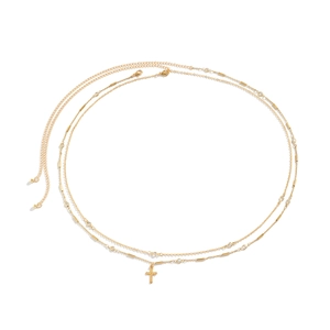 Detailed view of a gold-plated double-layer waist chain featuring a cross pendant and crystals