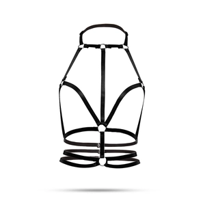 Vue détaillée du harnais de corps élastique noir avec anneaux métalliques argentés réglables