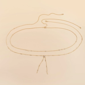 Double-layer gold body chain for women featuring clear crystals and metal cylinder beads