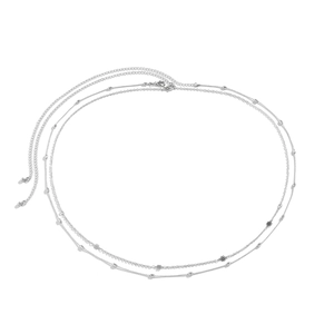 Detail of silver double-layered body chain with small flower charms and adjustable clasp