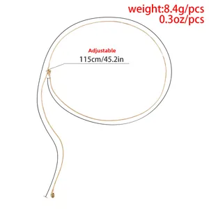 Adjustable golden double-layer metal waist chain with elegant round pendant detail