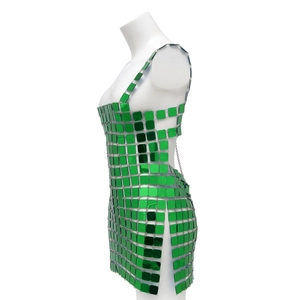 Detail of green acrylic square sequins connected by silver metal rings on body chain dress
