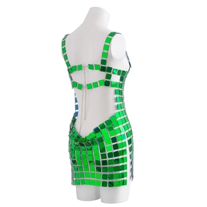 Detail of bright green square sequins and silver chains on a sexy backless body chain dress