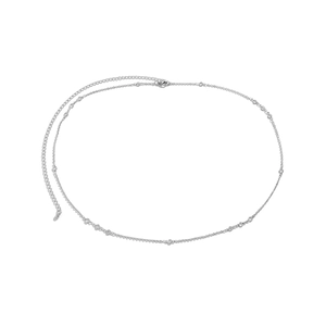 Detail of silver thin body chain featuring round clear rhinestones and lobster clasp