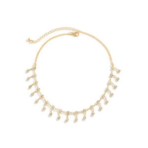 Detail of gold bikini waist chain with crystal tassels and adjustable lobster clasp