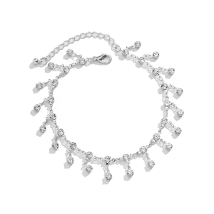 Detail showing silver bohemian body chain with sparkling rhinestone tassel and lobster clasp
