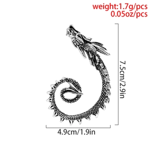 Detail view of silver dragon ear cuff showing scales and 7.5cm length measurement