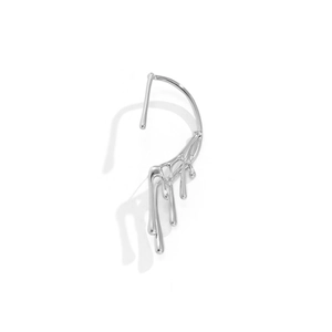 Detail of silver liquid metal ear cuff with avant-garde lava flow design and high gloss
