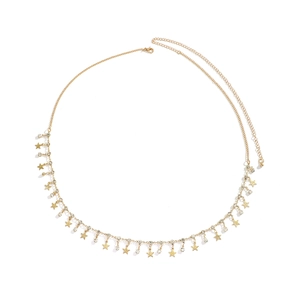Detailed close-up of gold waist chain featuring rhinestone star charms and lobster clasp