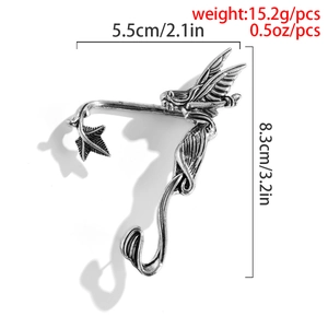 Macro shot of silver elf ear cuff with wing details and dimensions 8.3cm by 5.5cm