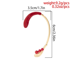 Detailed size specifications for gold and red enamel elf ear cuff with rhinestones