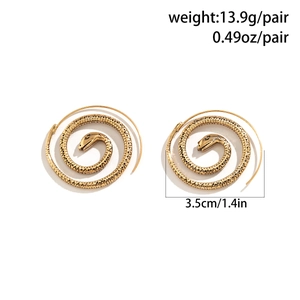 Detailed view of vintage gold snake ear cuffs with weight and size specifications