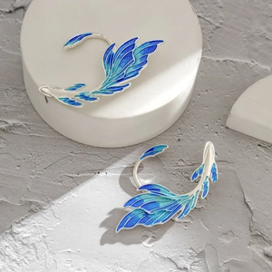 Exquisite silver betta fish ear cuffs with blue-green gradient enamel and crystal details