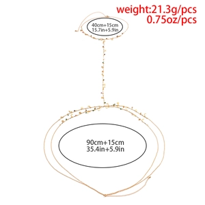 Detailed size chart of gold star and moon body chain with tassels and length specifications