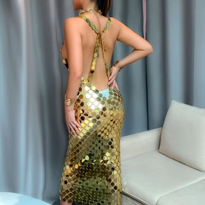 Detail of gold metal disc chain body dress showing backless sequins and hollow craftsmanship