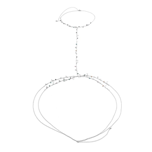 Sexy silver body chain with star and moon charms and colorful beads on white background
