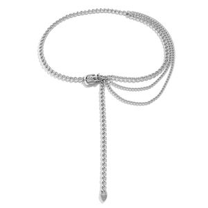 Close-up of silver multi-layer chain belt with dangling fringe and metal taper pendant