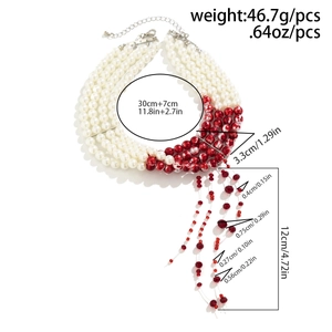 Detailed view of beaded choker with layered red drip tassels and pearl measurements