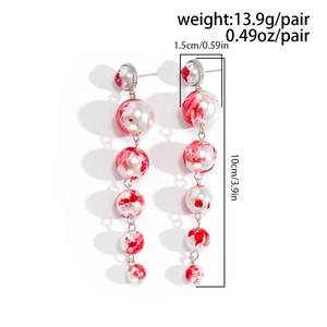 Gothic style long drop earrings with red blood splatter pearls and silver needles