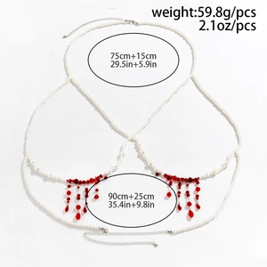Gothic body chain with white pearls and red blood-drop tassels on white background