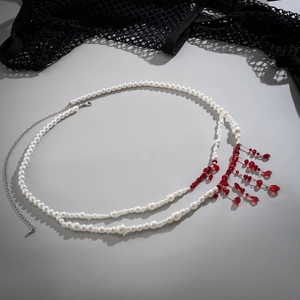 Gothic choker with white pearls and red blood-drop tassels for Halloween aesthetic