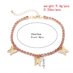 Macro detail of butterfly necklace with pink rhinestones and precise size measurements