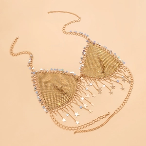 Detail of gold sequin body chain bralette with fringe tassels and star charms
