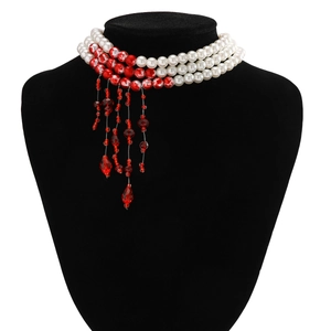 Detail of Gothic pearl choker with red marble beads and crystal blood drop tassels
