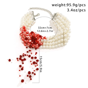 Detailed view of gothic blood drip tassel choker with pearls and red beads