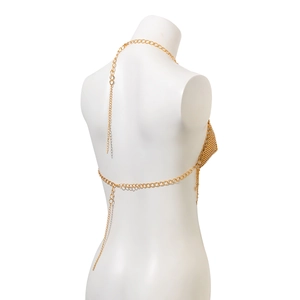 Detailed back view of golden sequin mesh body chain with star accents for beach parties