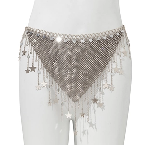 Macro detail of silver mesh body chain with sparkling rhinestones and star tassels
