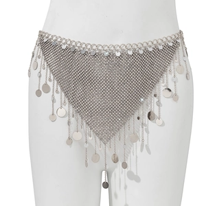 Detail of silver body chain with star sequins and tassel mesh on a mannequin