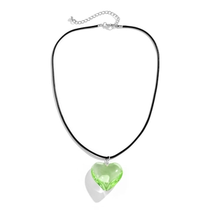 Close-up of green resin heart pendant with black cord chain and silver clasp