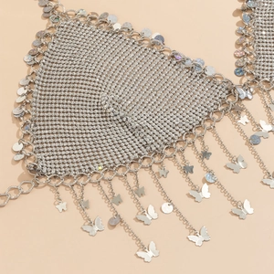 Detail of silver rhinestone mesh body chain with star charms and sequins for beach styling