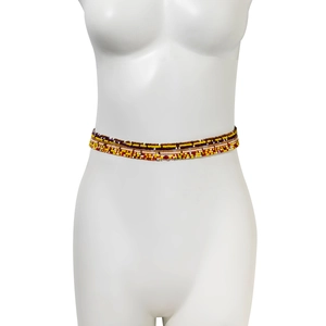 Detail view of multi-layered colorful seed bead waist chains on a mannequin