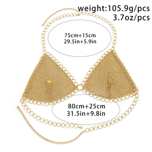 Detail of gold rhinestone mesh body chain showing star tassels and adjustable ring links