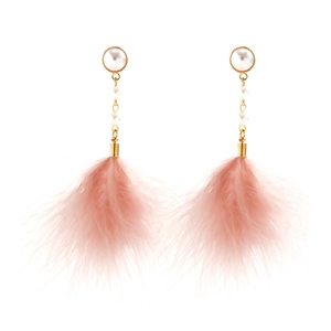 Detail of elegant pink feather tassel earrings with imitation pearls and gold chains