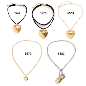 Minimalist heart pendant necklaces and chokers in gold, silver, and black velvet designs
