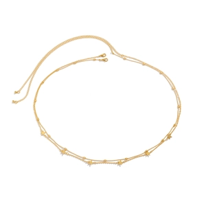 Detail of gold double-layered waist chain with star charms and lobster clasp closure