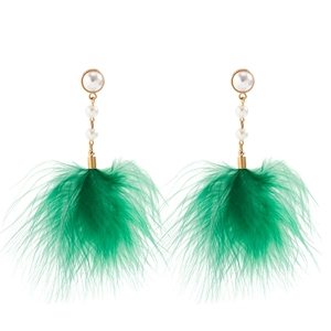 Detail of long drop earrings featuring white pearls and lush green feather tassels