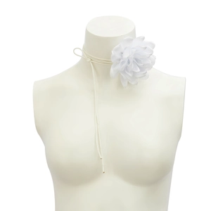 Detail of white 3D fabric flower choker with adjustable tassels on mannequin