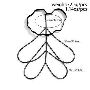 Detail view of elastic black thigh chain with layered metal links and weight specifications