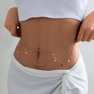 Detail of double-layer gold body chain with white rhinestones and star pendants